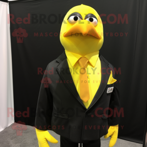 Lemon Yellow Blackbird mascot costume character dressed with a Suit Jacket and Tie pins