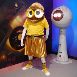 Gold Cyclops mascot costume character dressed with a Board Shorts and Scarf clips