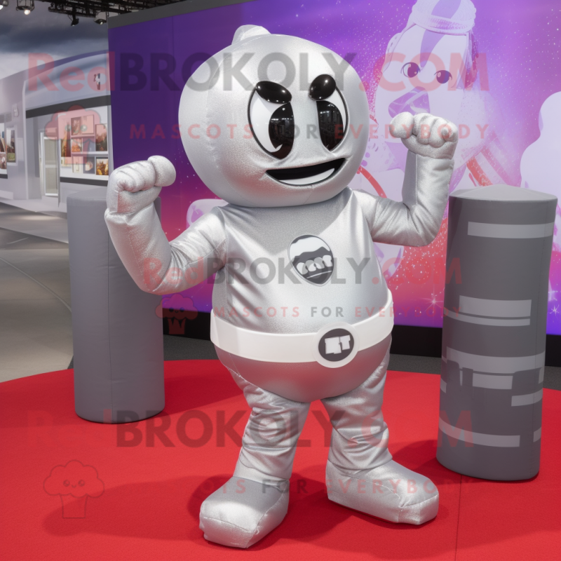 Silver Boxing Glove mascot costume character dressed with a Wrap Skirt and Backpacks Silver Boxing Glove mascot costume character dressed with a Wrap Skirt and Backpacks