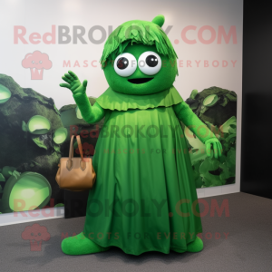 Forest Green Cyclops mascot costume character dressed with a Wrap Dress and Handbags