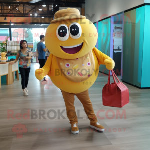 Gold Donut mascot costume character dressed with a Button-Up Shirt and Tote bags
