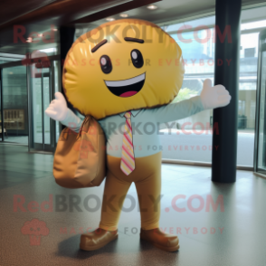 Gold Donut mascot costume character dressed with a Button-Up Shirt and Tote bags