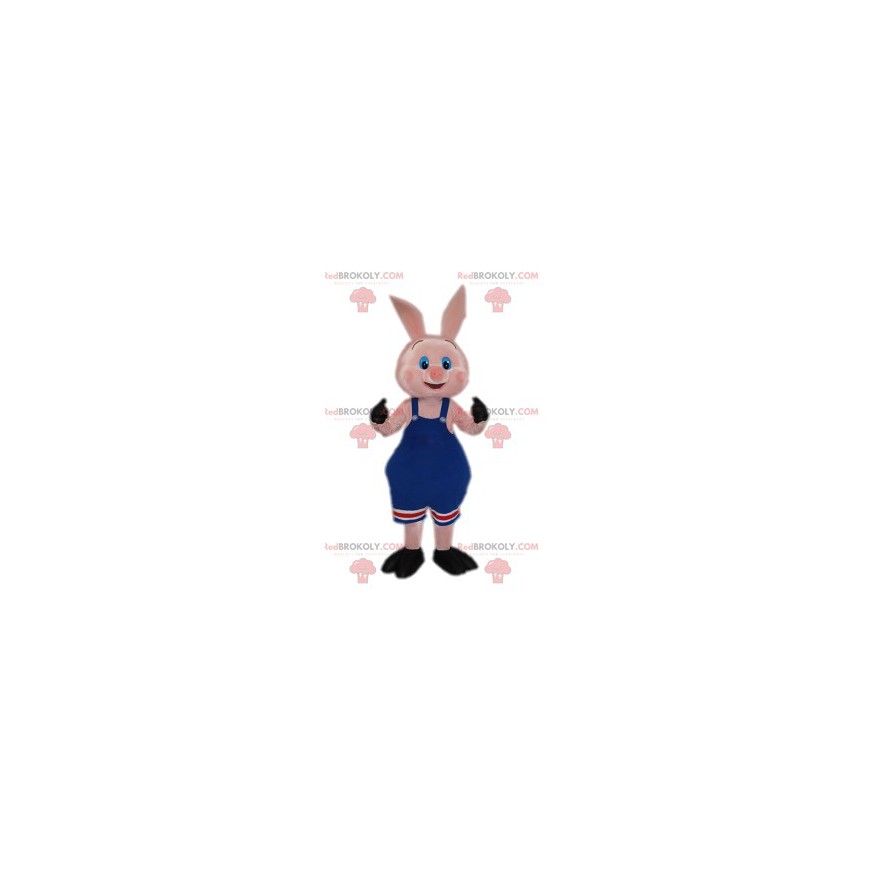 Mascotte de petit cochon rose avec sa salopette bleue -
