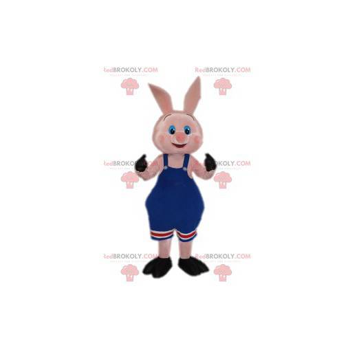 Mascot cerdito rosa con su mono azul - Redbrokoly.com