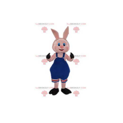 Mascot liten rosa gris med sine blå kjeledresser -