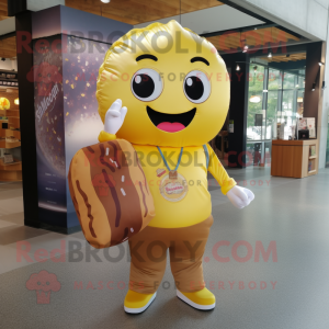 Gold Donut mascot costume character dressed with a Button-Up Shirt and Tote bags