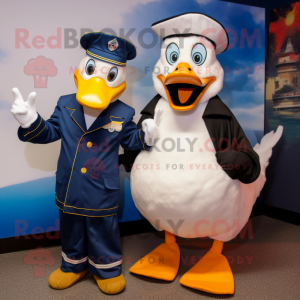 Navy Geese mascot costume character dressed with a Graphic Tee and Mittens