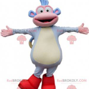 Mascot funny little blue monkey with his red boots -