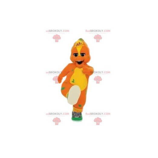 Mascot pato naranja y amarillo y su par de baloncesto verde -