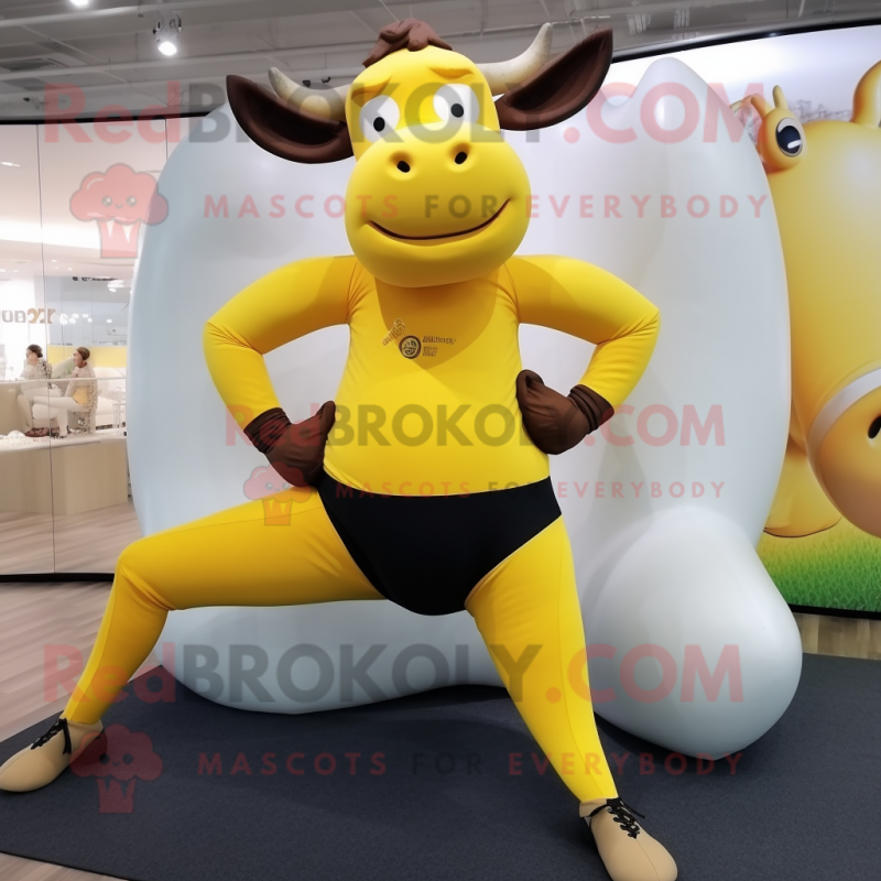 Yellow Bull mascot costume character dressed with a Yoga Pants and Belts Yellow Bull mascot costume character dressed with a Yoga Pants and Belts
