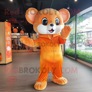 Orange Dormouse mascot costume character dressed with a Long Sleeve Tee and Keychains