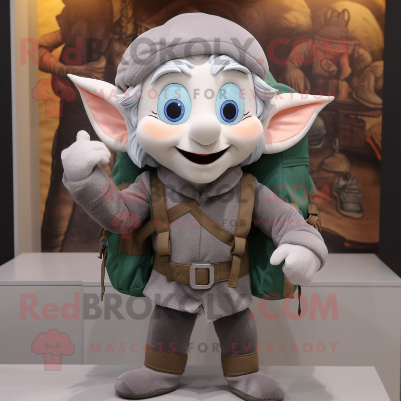 Gray Elf mascot costume character dressed with a Vest and Backpacks