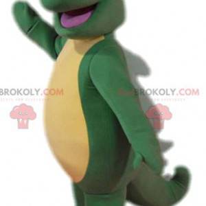 Mascota de lagarto verde súper cómico con su gran cola -