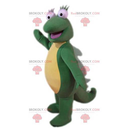 Mascota de lagarto verde súper cómico con su gran cola -