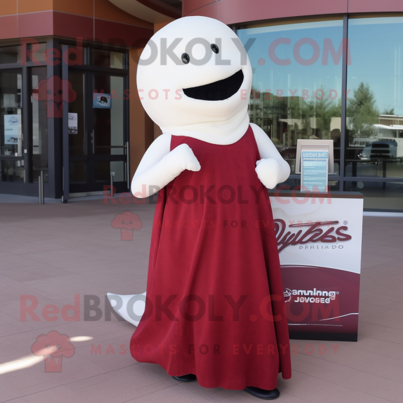 Maroon Beluga Whale mascot costume character dressed with a Empire Waist Dress and Earrings