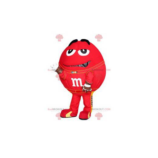 Mascotte di M & M'S rossa con i suoi enormi occhi -