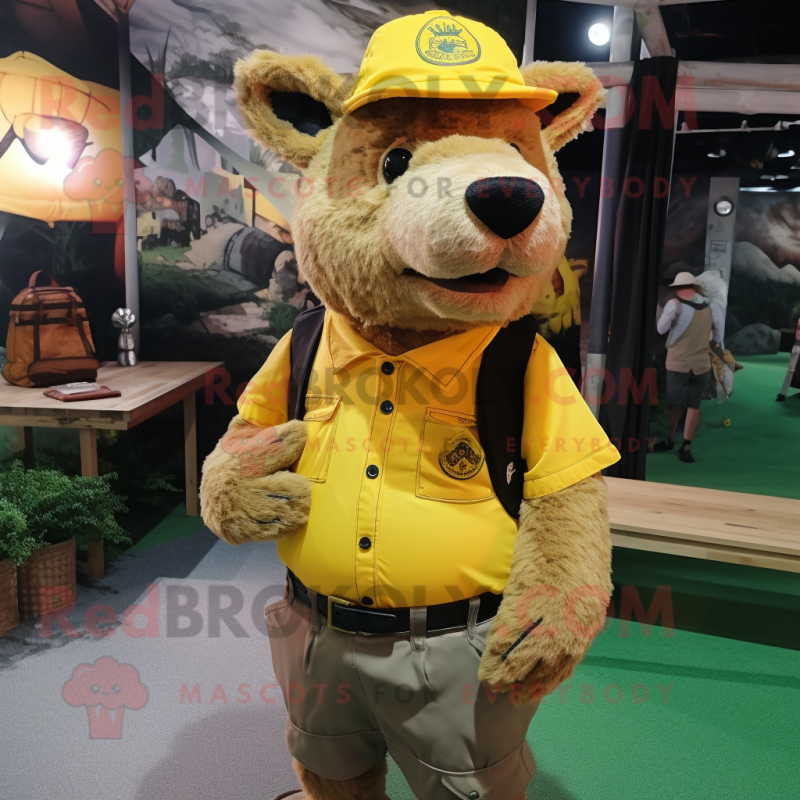 Yellow Wild Boar mascot costume character dressed with a Cargo Shorts and Hat pins Yellow Wild Boar mascot costume character dressed with a Cargo Shorts and Hat pins
