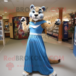 Blue Mountain Lion mascot costume character dressed with a Empire Waist Dress and Wraps