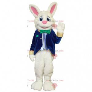 Fröhliches weißes Kaninchenmaskottchen im blau-weißen Kostüm -