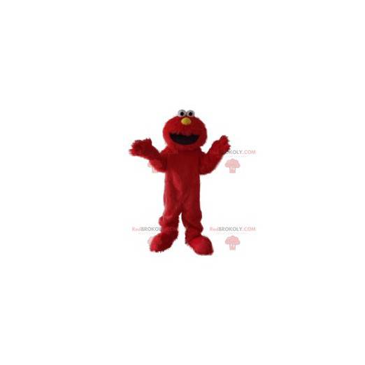 Morsom og smilende hårete rød monster maskot - Redbrokoly.com