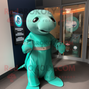 Teal Stellar'S Sea Cow mascot costume character dressed with a A-Line Dress and Smartwatches
