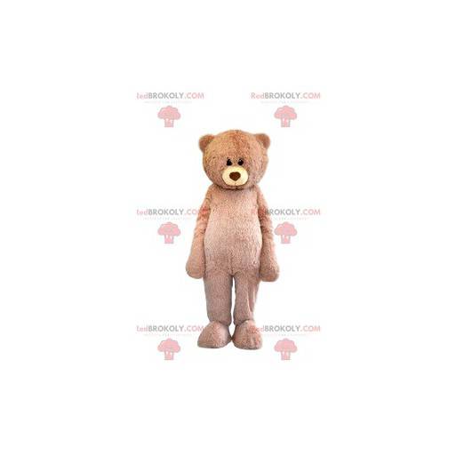 Mascotte d'ours beige trop mignon avec son regard tendre -