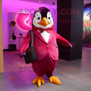 Magenta Penguin mascot costume character dressed with a Suit Jacket and Clutch bags