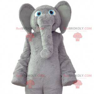 Mascote elefante cinzento com um casaco macio e um grande
