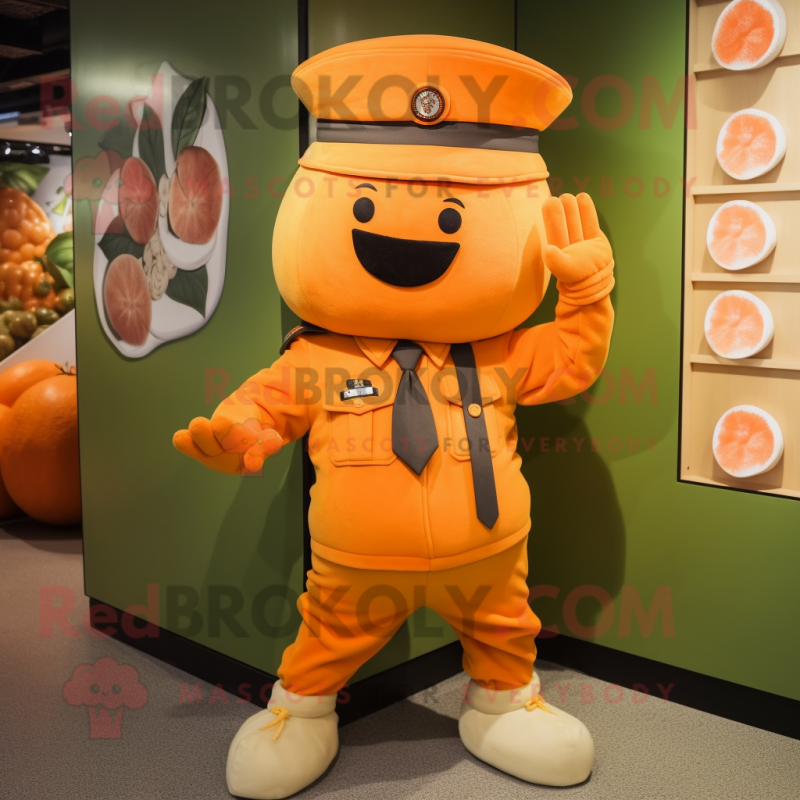 Orange Mango mascot costume character dressed with a Cargo Shorts and Berets