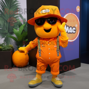 Orange Mango mascot costume character dressed with a Cargo Shorts and Berets