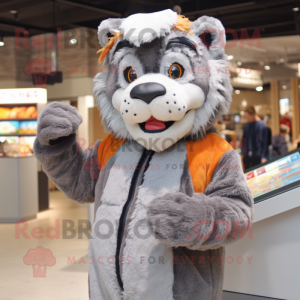 Gray Saber-Toothed Tiger mascot costume character dressed with a Cardigan and Caps