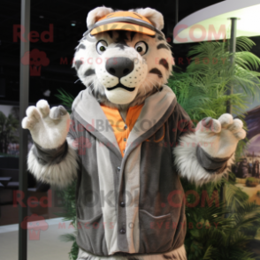 Gray Saber-Toothed Tiger mascot costume character dressed with a Cardigan and Caps