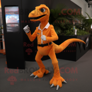 Orange Velociraptor mascot costume character dressed with a Capri Pants and Smartwatches