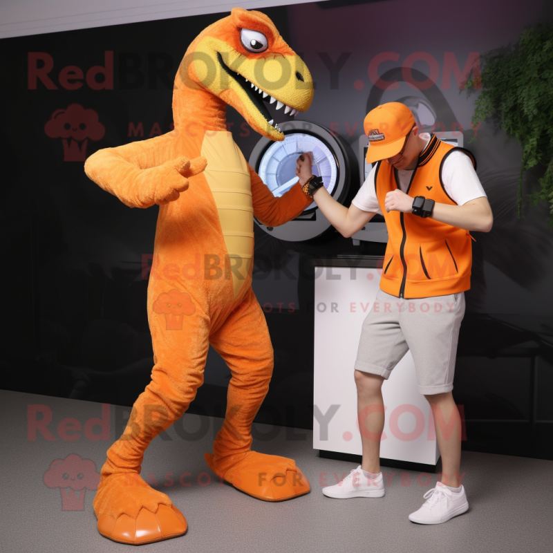 Orange Velociraptor mascot costume character dressed with a Capri Pants and Smartwatches