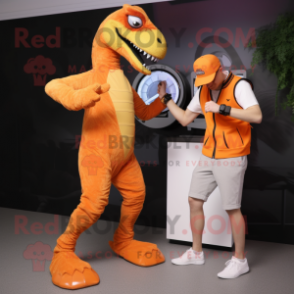 Orange Velociraptor mascot costume character dressed with a Capri Pants and Smartwatches