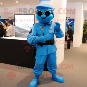 Blue Marine Recon mascot costume character dressed with a Dress Pants and Watches