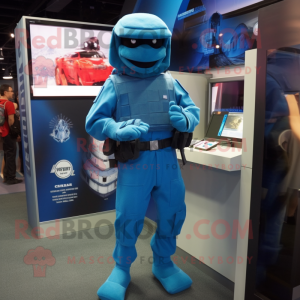 Blue Marine Recon mascot costume character dressed with a Dress Pants and Watches