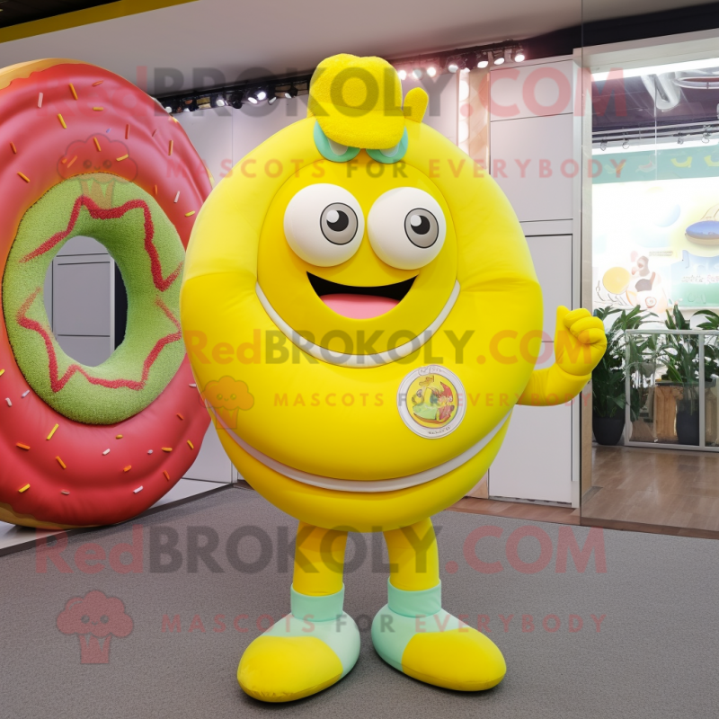 Lemon Yellow Donut mascot costume character dressed with a Polo Shirt and Bracelet watches