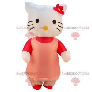 Hello Kitty mascot with her pink dress and red flower -