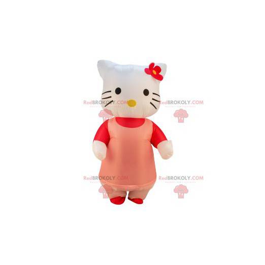 Hello Kitty maskot med sin rosa klänning och röda blomma -