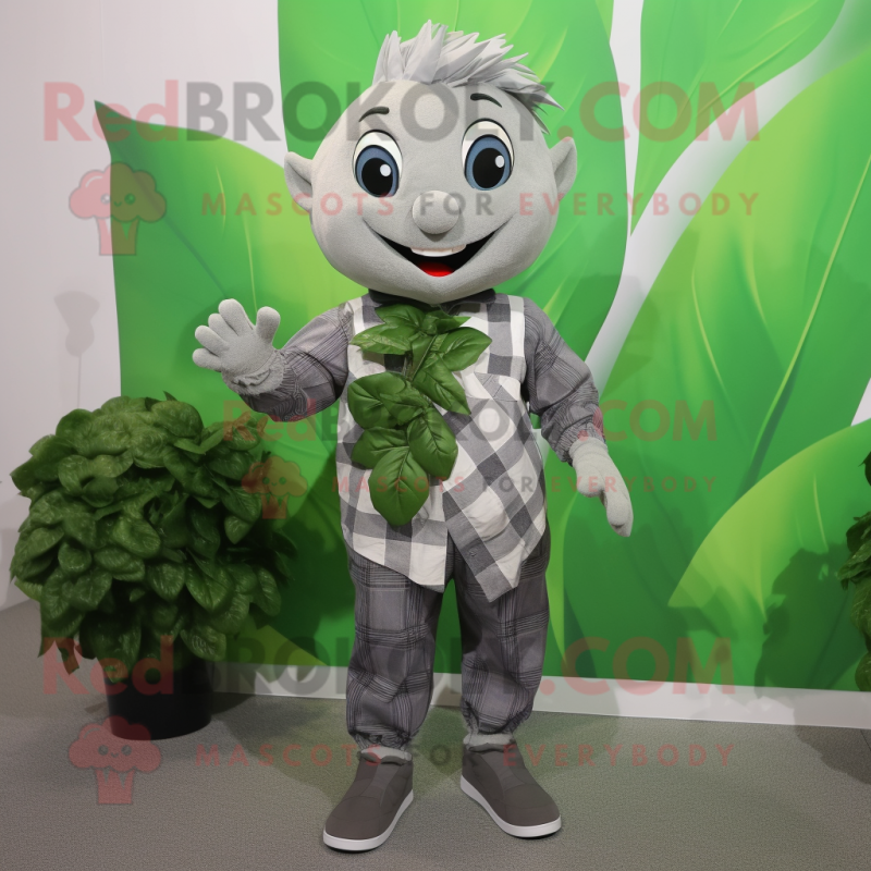 Silver Spinach mascot costume character dressed with a Flannel Shirt and Tie pins