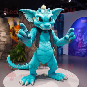 Turquoise Gargoyle mascot costume character dressed with a Bikini and Mittens