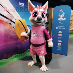 Pink Chupacabra mascot costume character dressed with a Board Shorts and Tote bags