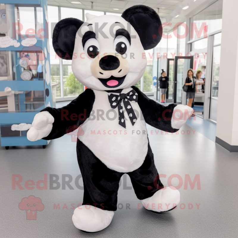 Black Ermine mascot costume character dressed with a Boyfriend Jeans and Bow ties Black Ermine mascot costume character dressed with a Boyfriend Jeans and Bow ties