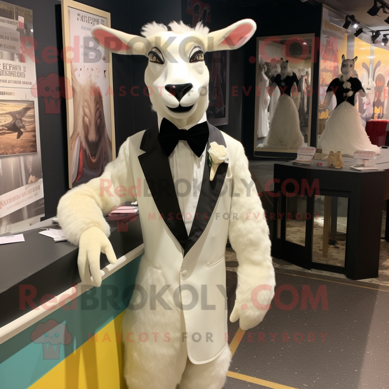 Cream Goat mascot costume character dressed with a Tuxedo and Hair clips