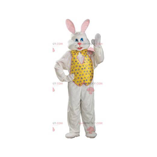 Mascote coelho branco com paletó e gravata borboleta amarela -