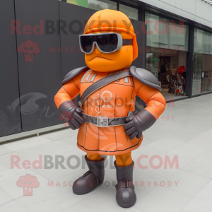 Orange Roman Soldier mascot costume character dressed with a Biker Jacket and Sunglasses