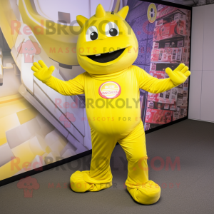 Yellow Momentum mascot costume character dressed with a Jumpsuit and Foot pads
