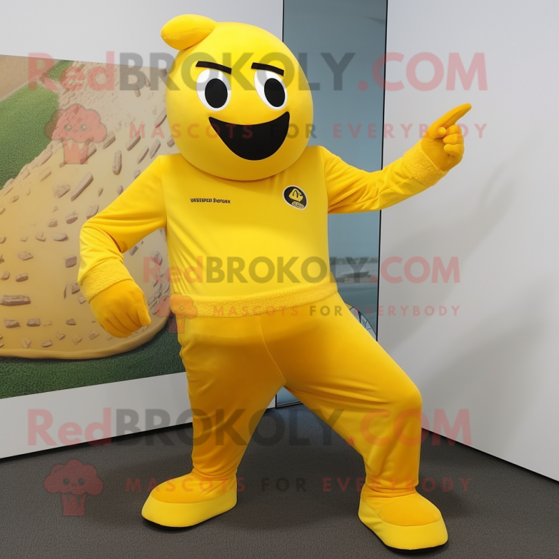 Yellow Momentum mascot costume character dressed with a Jumpsuit and Foot pads Yellow Momentum mascot costume character dressed with a Jumpsuit and Foot pads