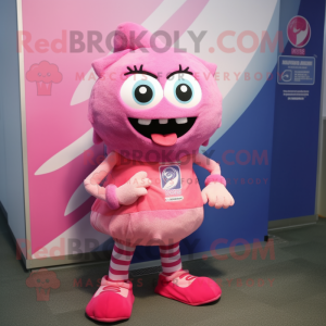 Pink Momentum mascot costume character dressed with a Shorts and Scarf clips